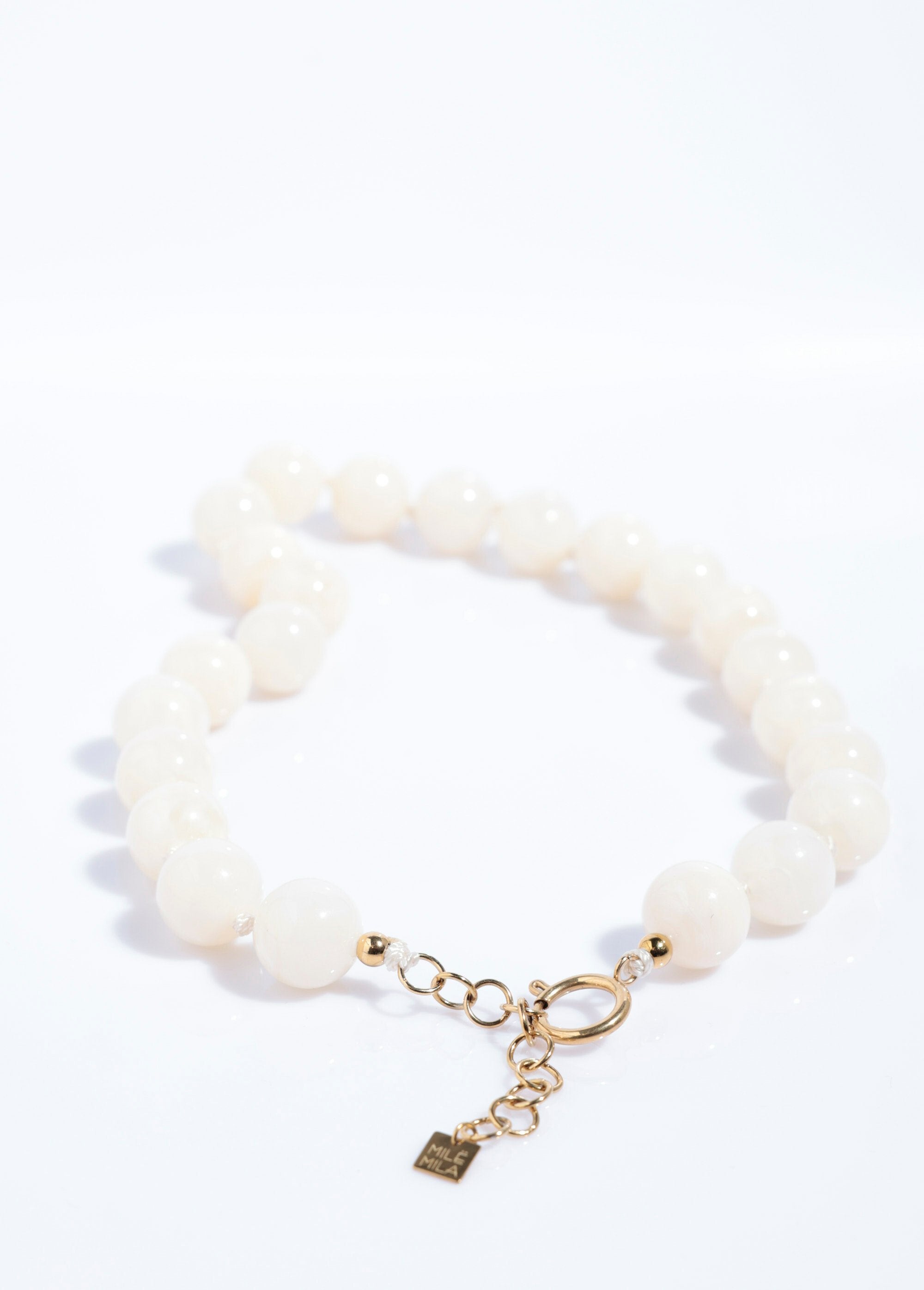 Collana_corta_di_perle_tonde_marmorizzate_Ivoire_DE2_slim