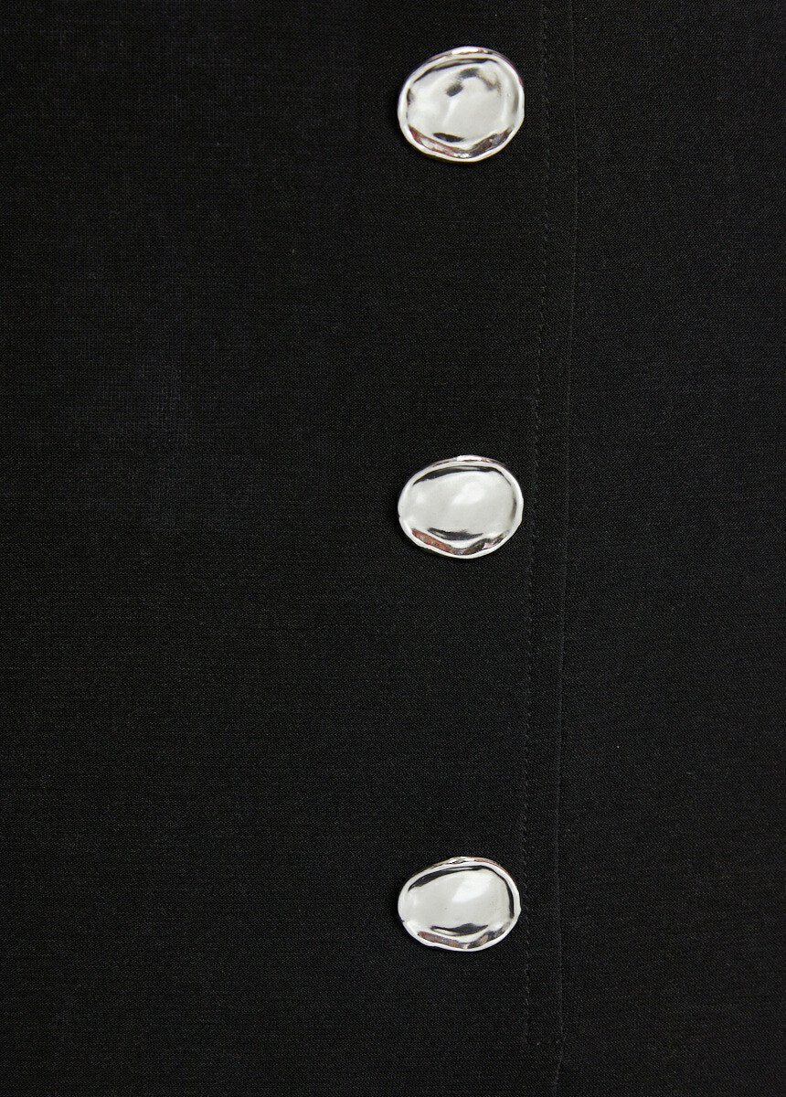 Gonna_svasata_di_media_lunghezza_in_maglia_liscia_con_ponte_Nero_DE2_slim
