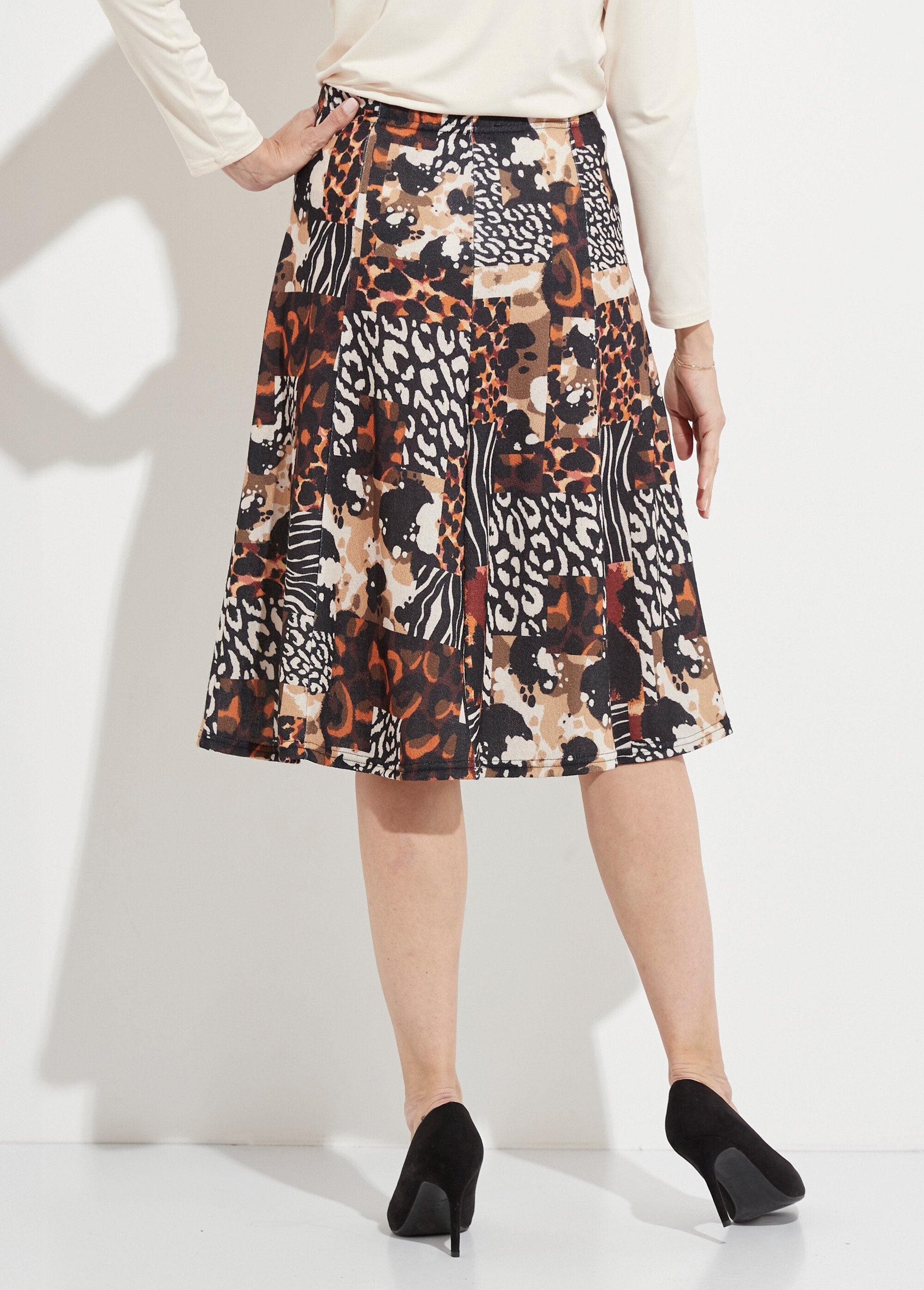 Gonna_svasata_di_media_lunghezza_in_calda_maglia_con_stampa_animalier_Noir_et_orange_DO1_slim