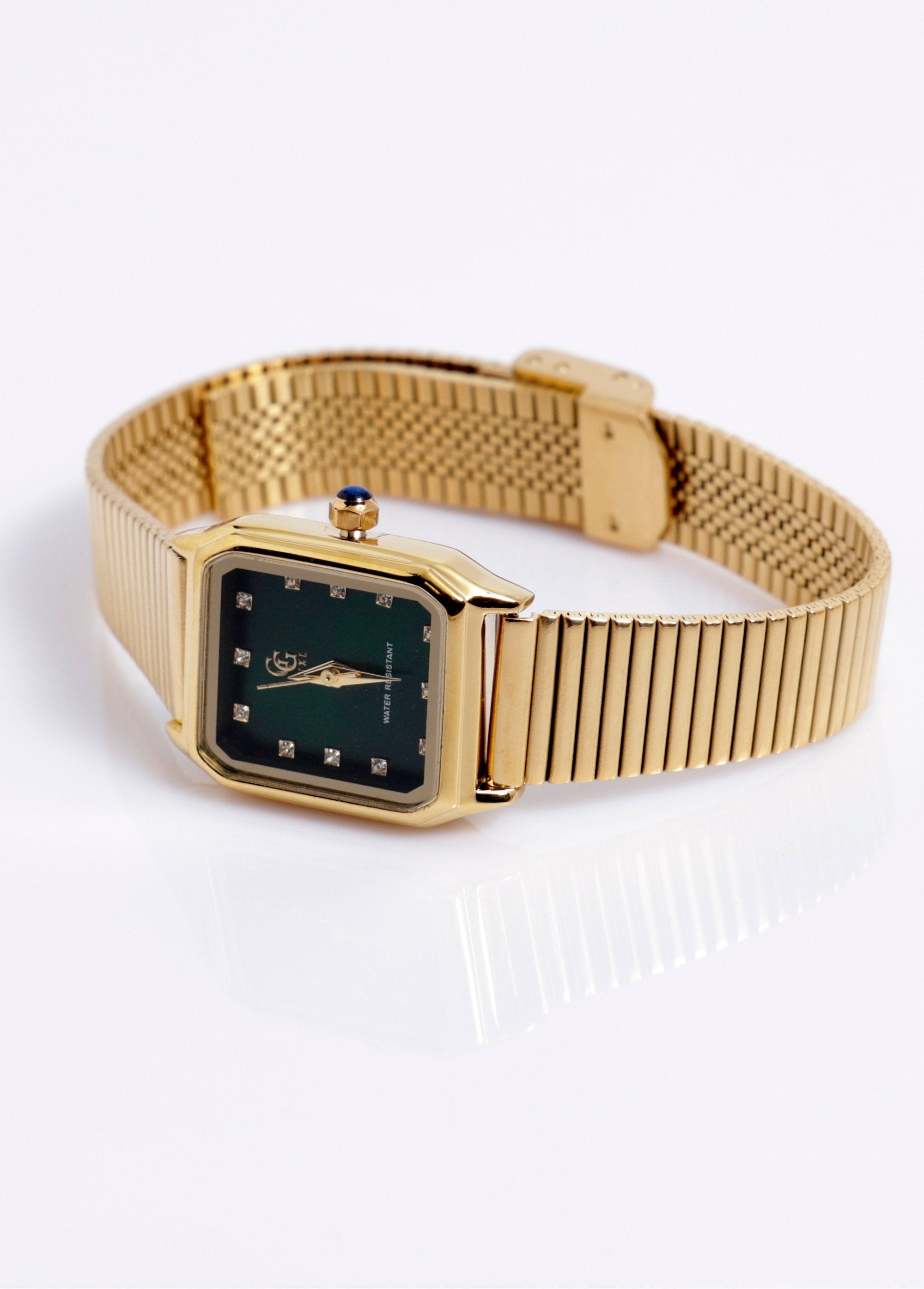 Orologio_gioiello_con_bracciale_in_maglia_a_coste_Or_vert_DE1_slim
