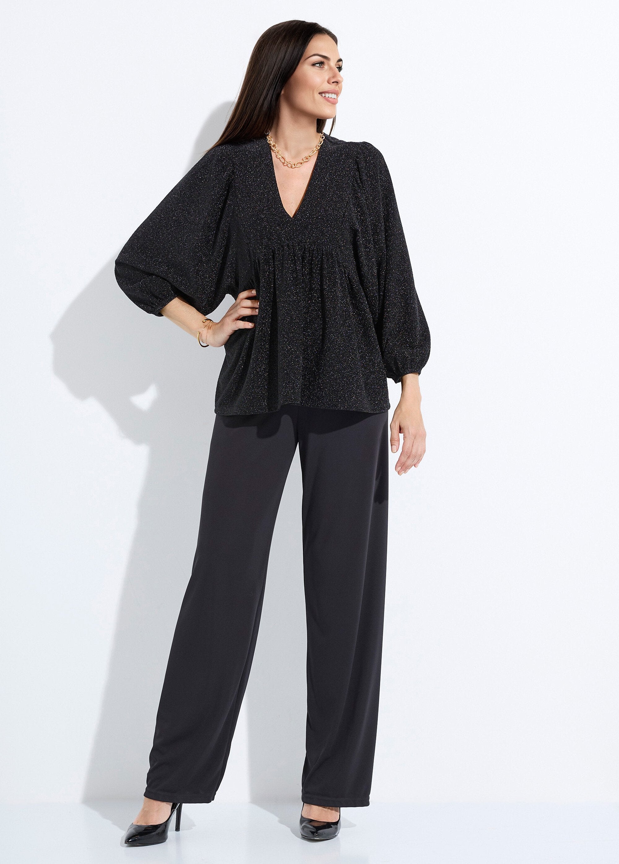 Tunica_in_maglia_lucida_con_maniche_a_sbuffo_Noir_SF1_slim