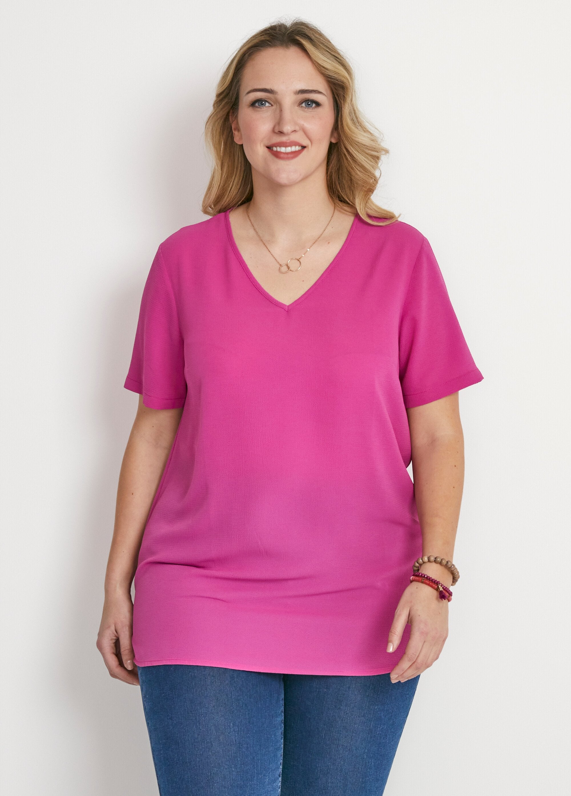 Tunica_aderente_di_media_lunghezza_in_tessuto_crepe_Uni_fuchsia_FA1_curvy