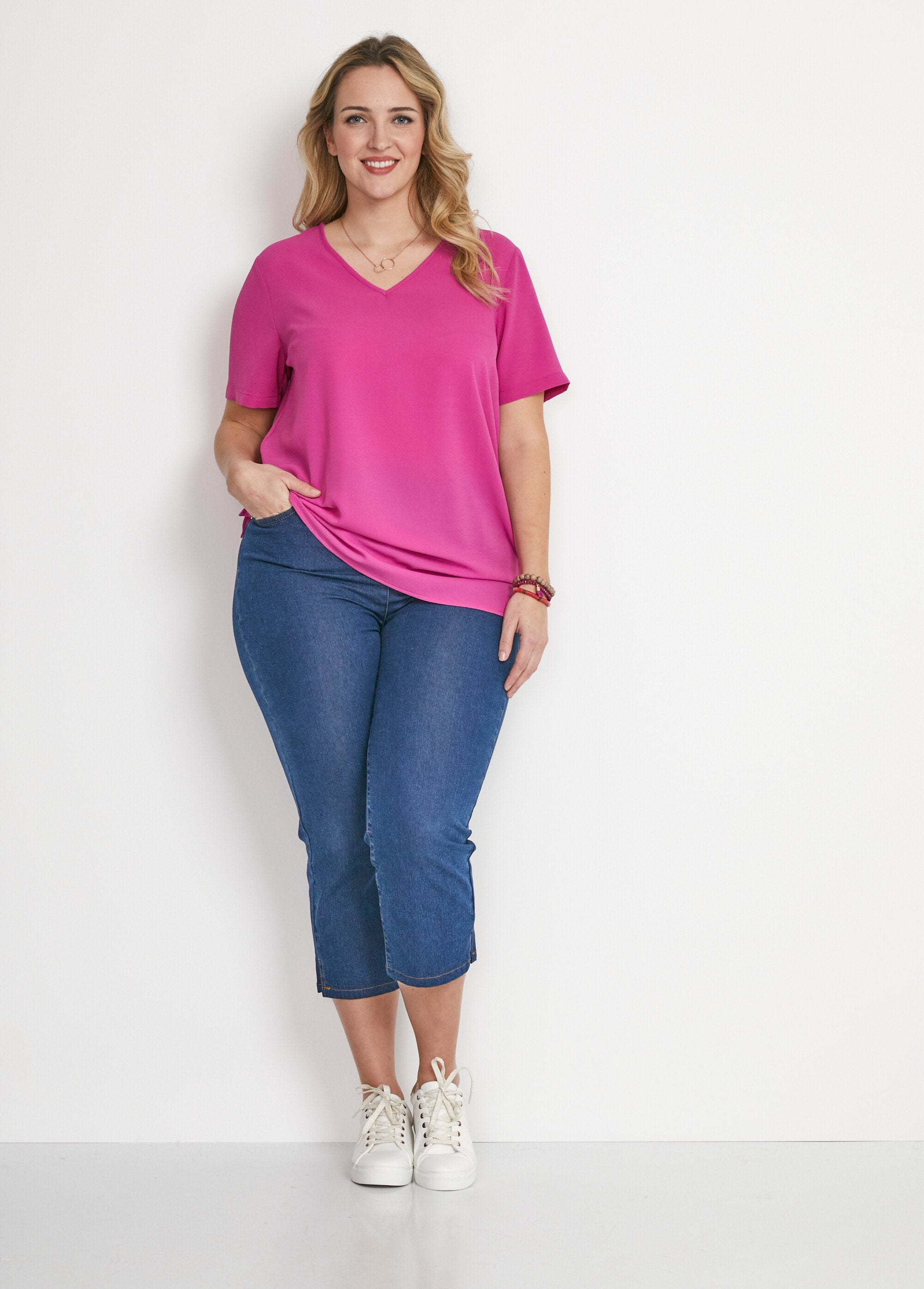 Tunica_aderente_di_media_lunghezza_in_tessuto_crepe_Uni_fuchsia_SF1_curvy