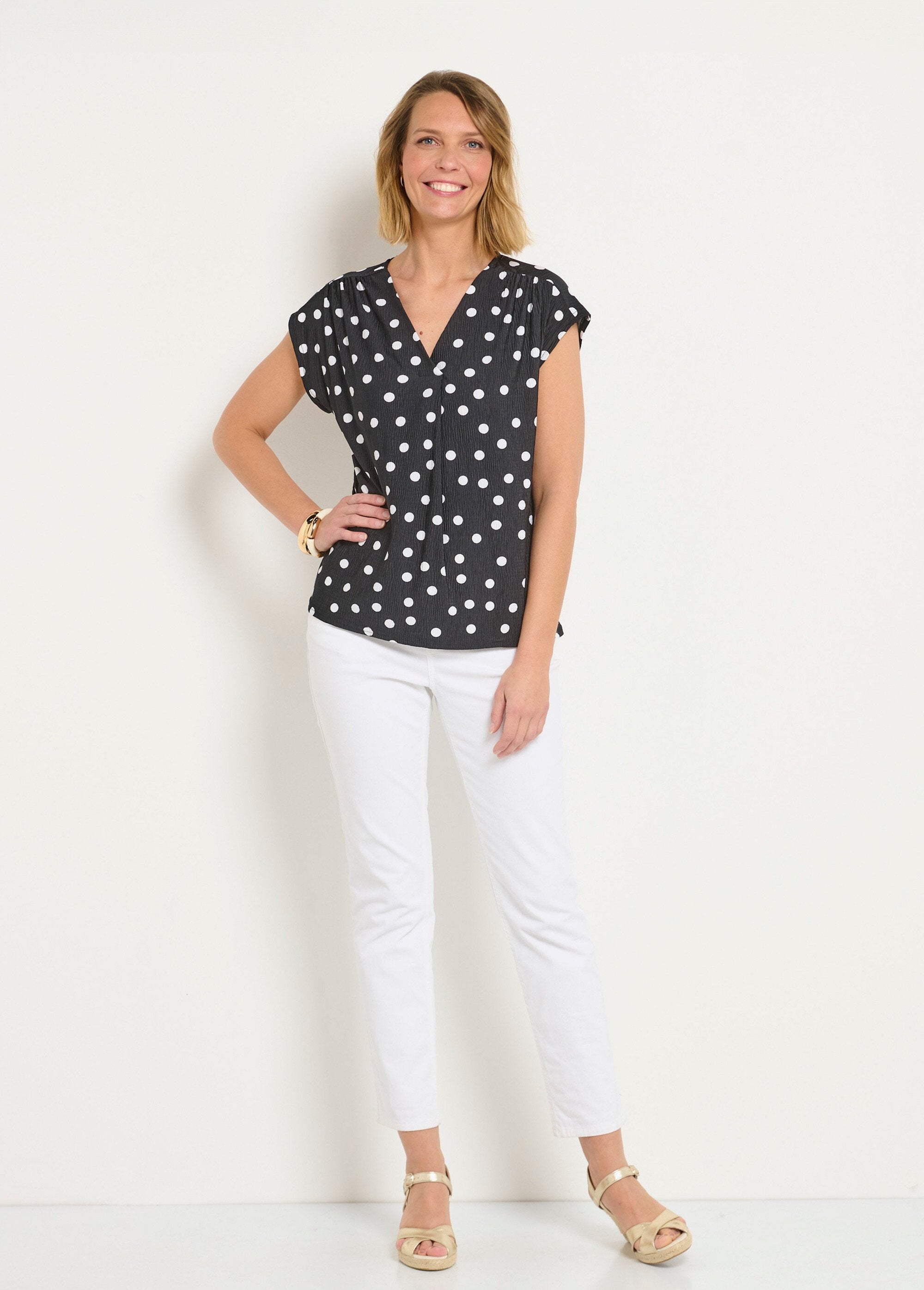 Tunica_stampata_a_pois_con_scollo_a_V_e_maniche_a_kimono_Noir_pois_SF1_slim