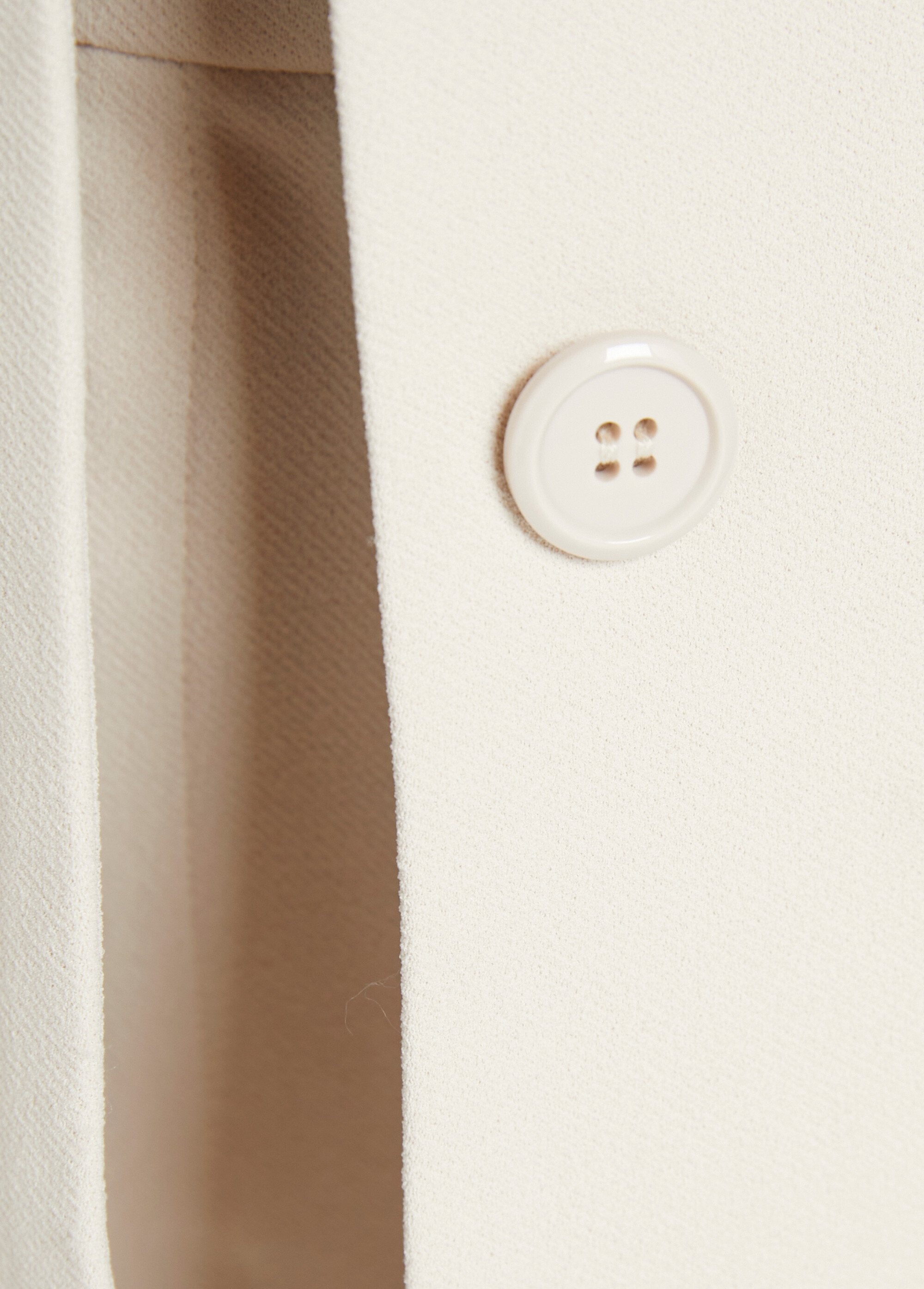 Blazer_dal_taglio_dritto_in_maglia_liscia_Beige_DE3_slim