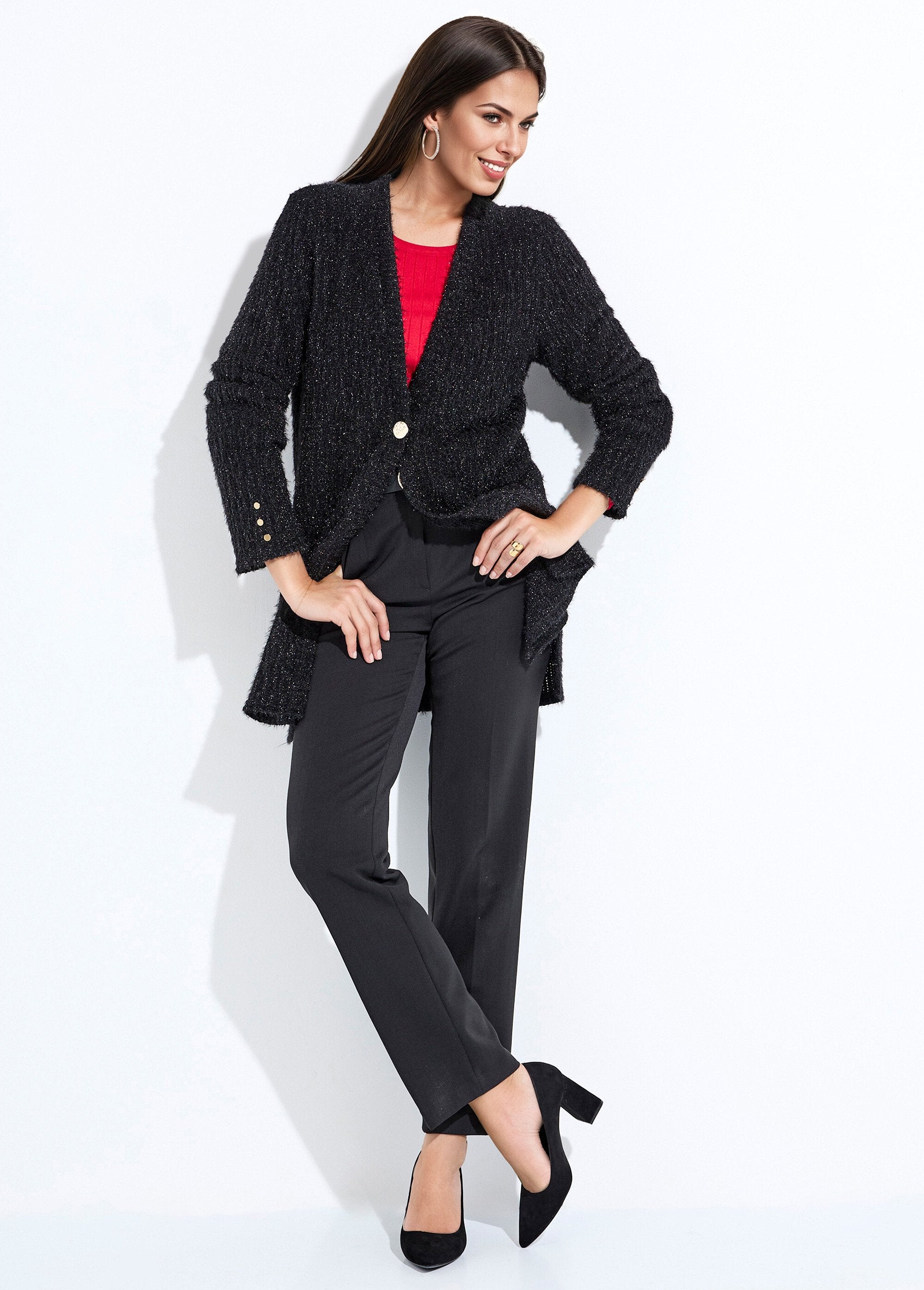 Cardigan_lungo_e_aderente_con_scollo_a_V_in_maglia_scintillante_goffrata_NERO_SF1_slim