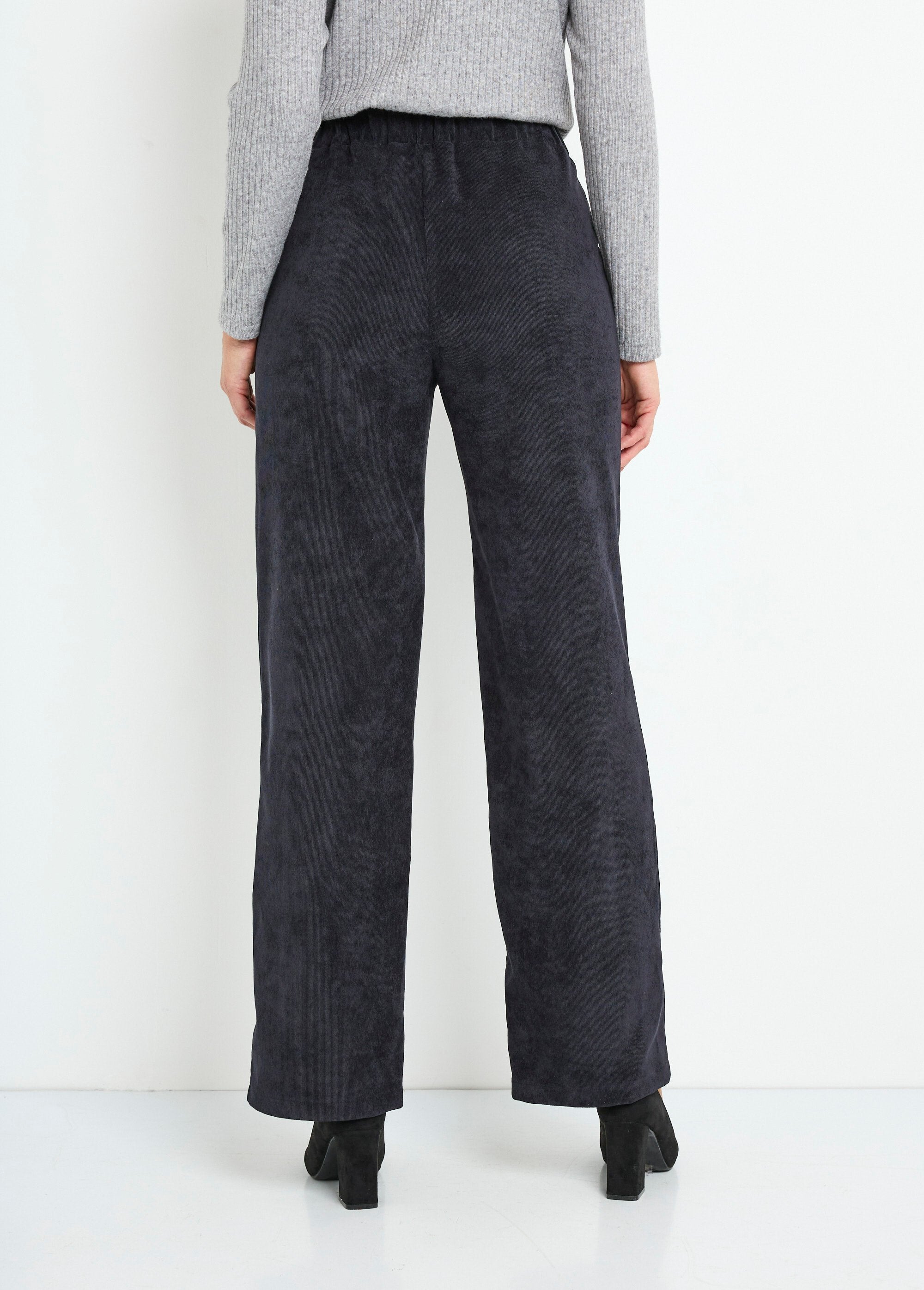 Pantaloni_a_gamba_larga_in_velluto_millerighe_con_vita_semi-elastica_Noir_DO1_slim