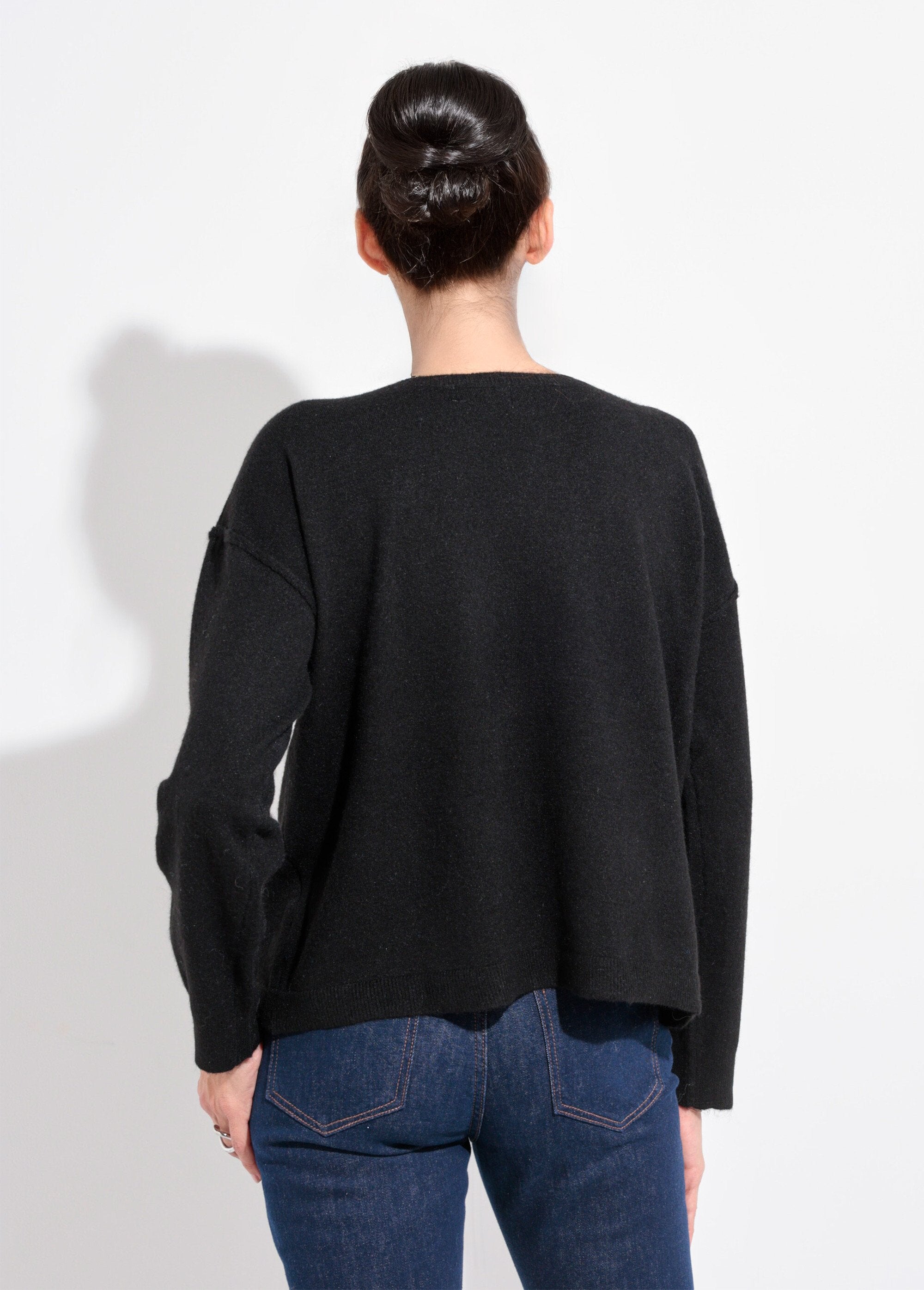 Caldo_maglione_a_collo_alto_in_lana_Noir_DO1_slim